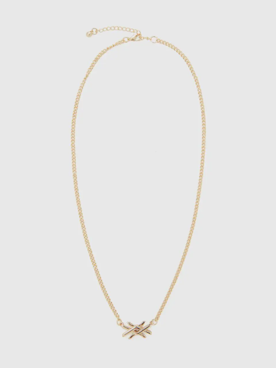 Benetton gold necklace with logo. 1