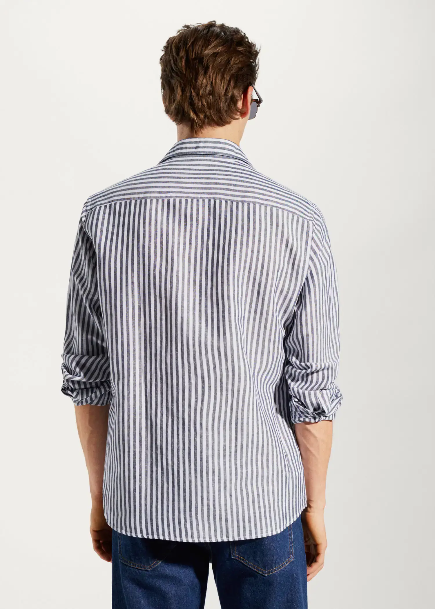 Mango Slim fit striped linen shirt. a man wearing glasses and a striped shirt. 