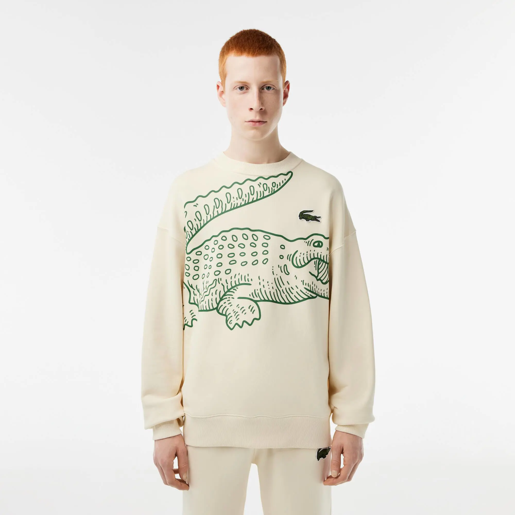 Lacoste Men’s Lacoste Round Neck Loose Fit Croc Print Jogger Sweatshirt. 1