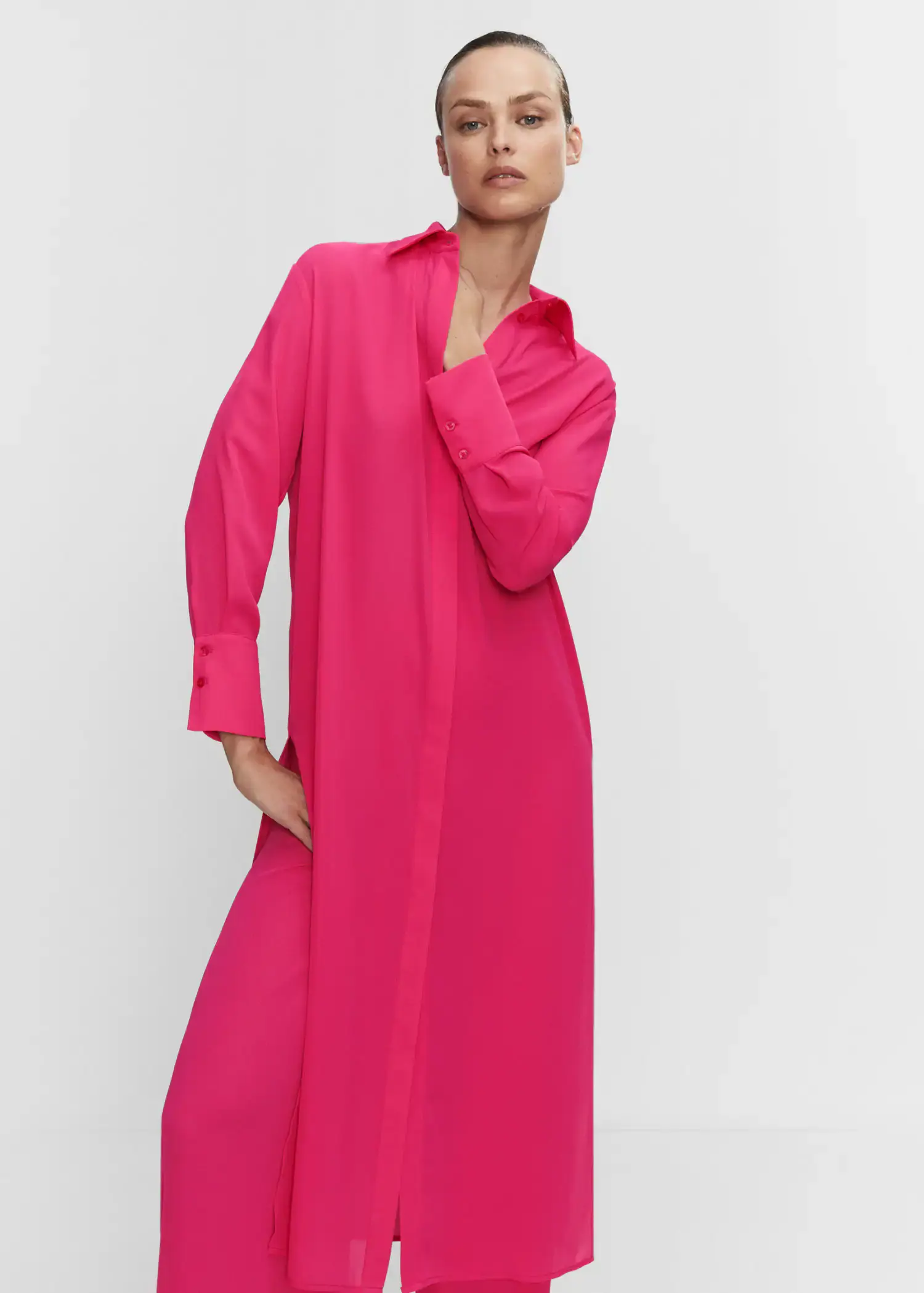 Mango Shirt dress with slits. a woman in a pink dress is posing. 