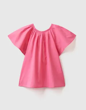 blouse in cotton with flaps