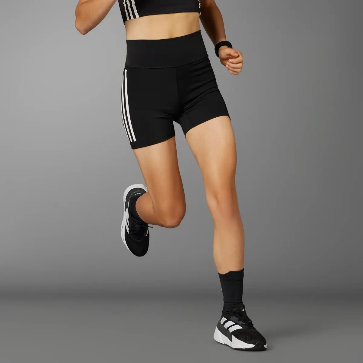 Adidas DailyRun 3-Streifen 5-inch Leggings. 1