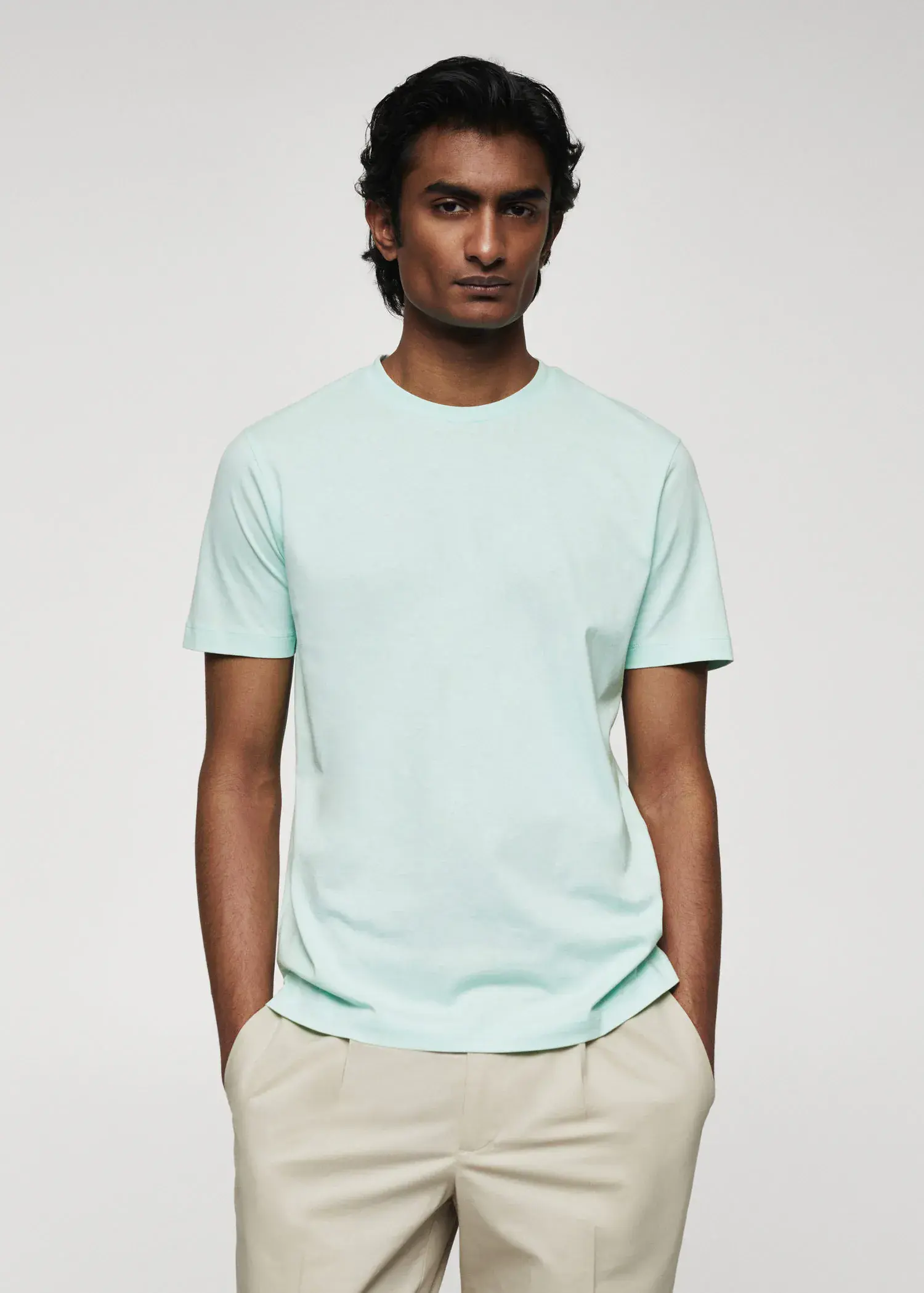 Mango 100% cotton t-shirt . a man wearing a light blue t-shirt. 