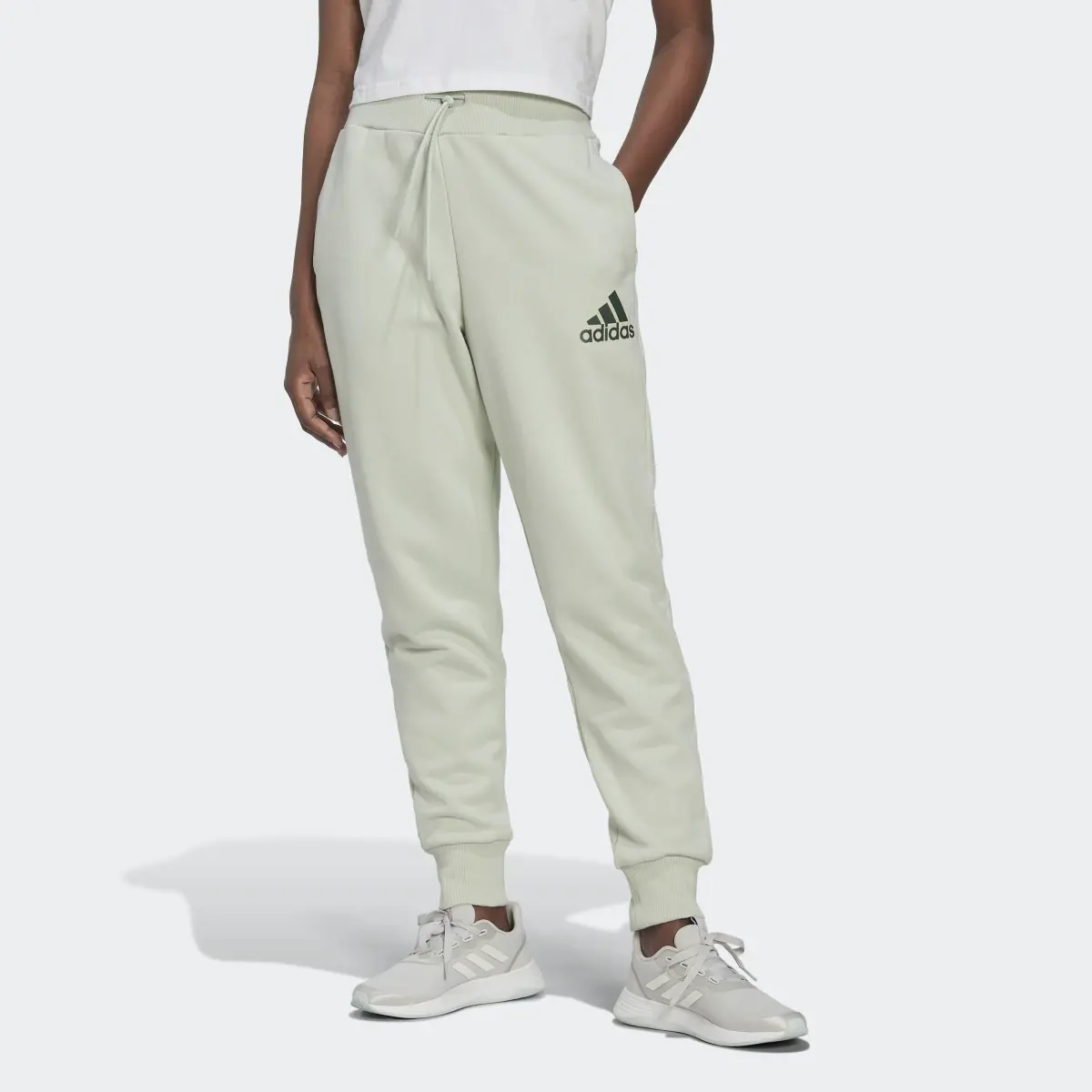 Adidas Essentials Multi-Colored Logo Joggers. 1