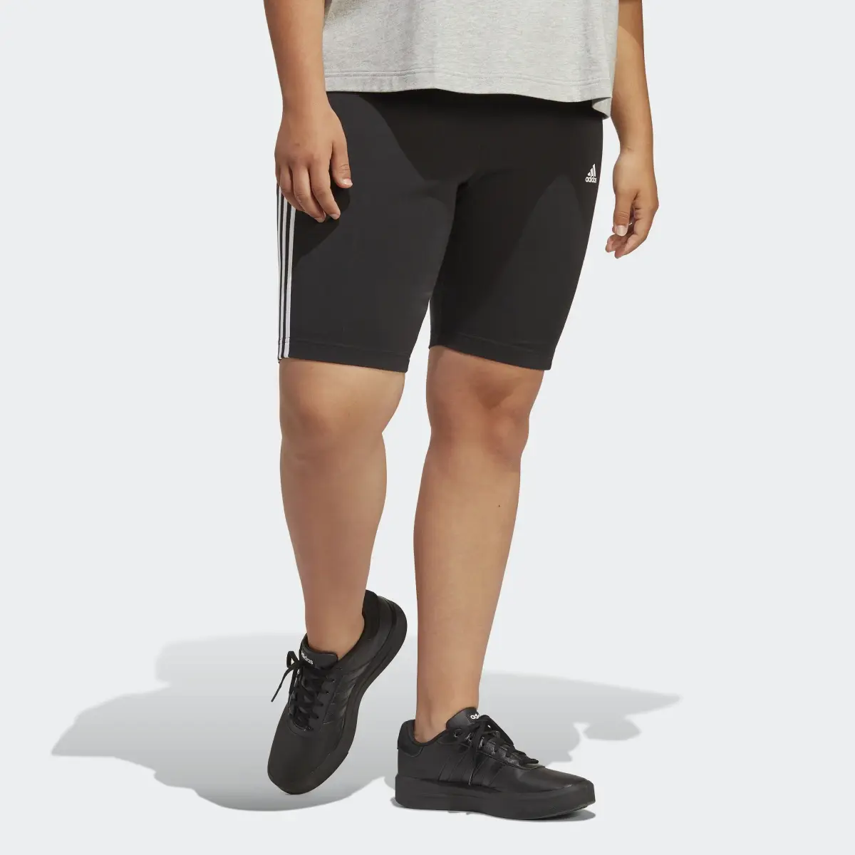 Adidas Essentials 3-Streifen kurze Tight. 2