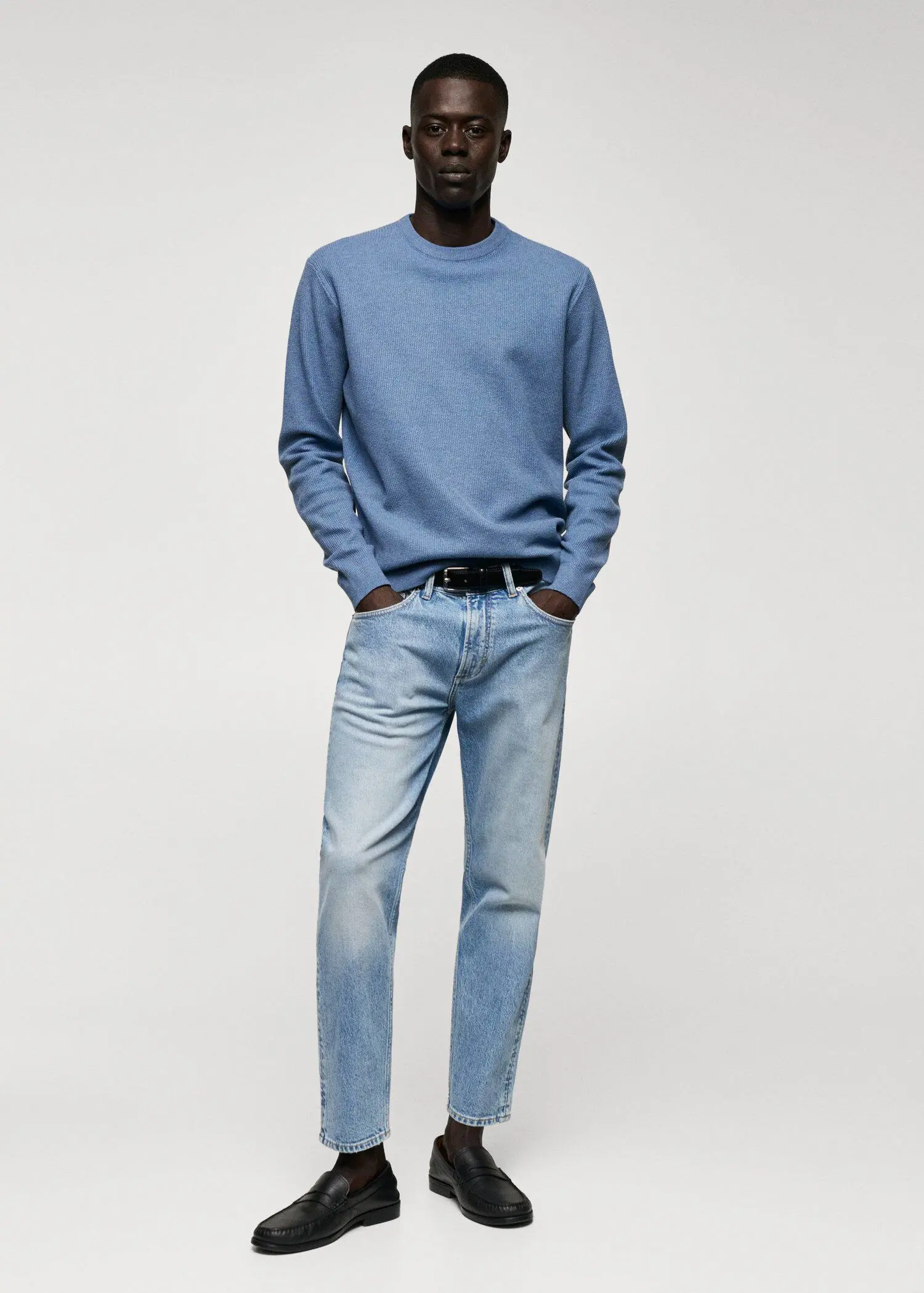 Mango Structured cotton sweater. a man in a blue sweater and jeans. 