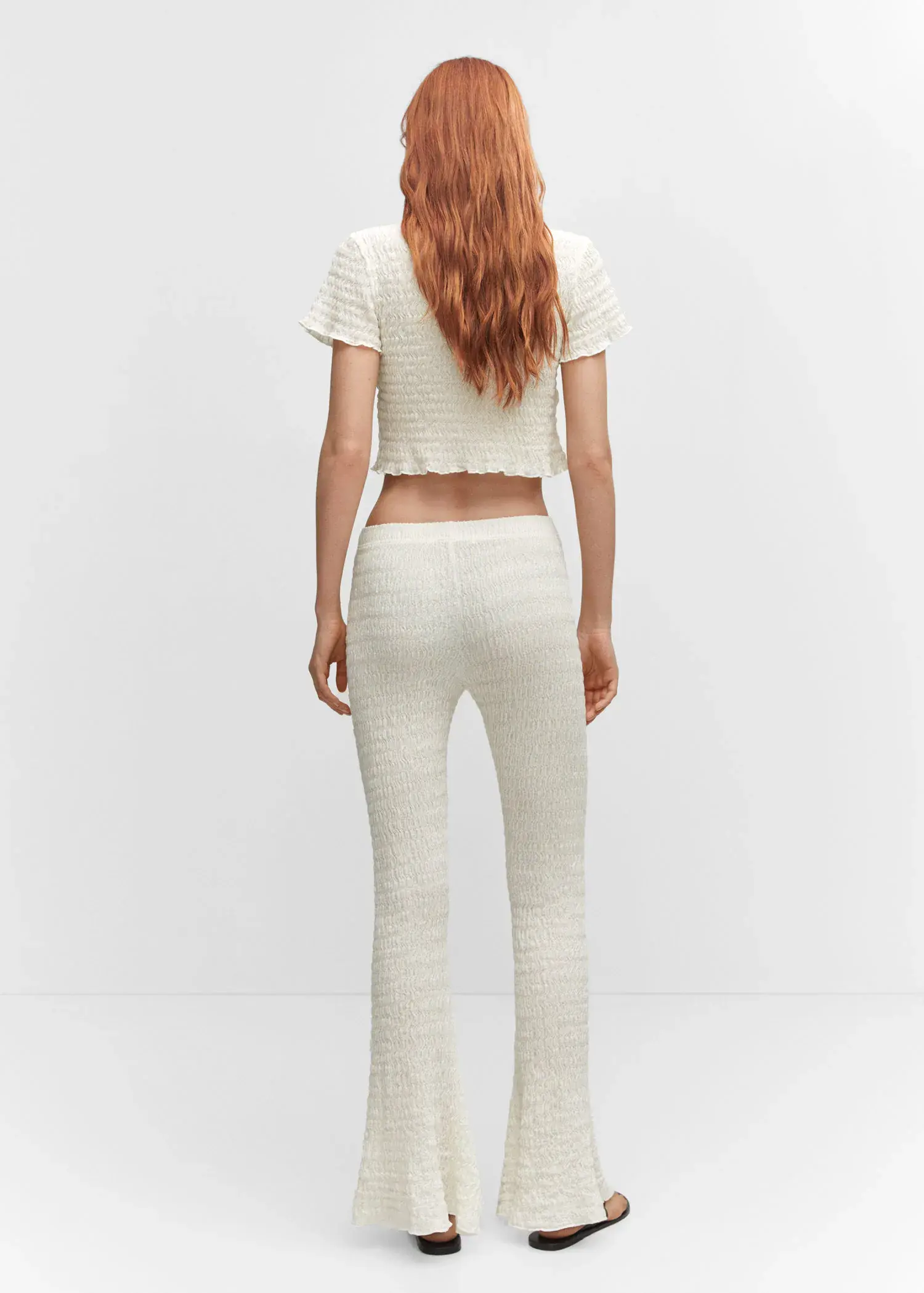 Mango Flared textured trousers. 3