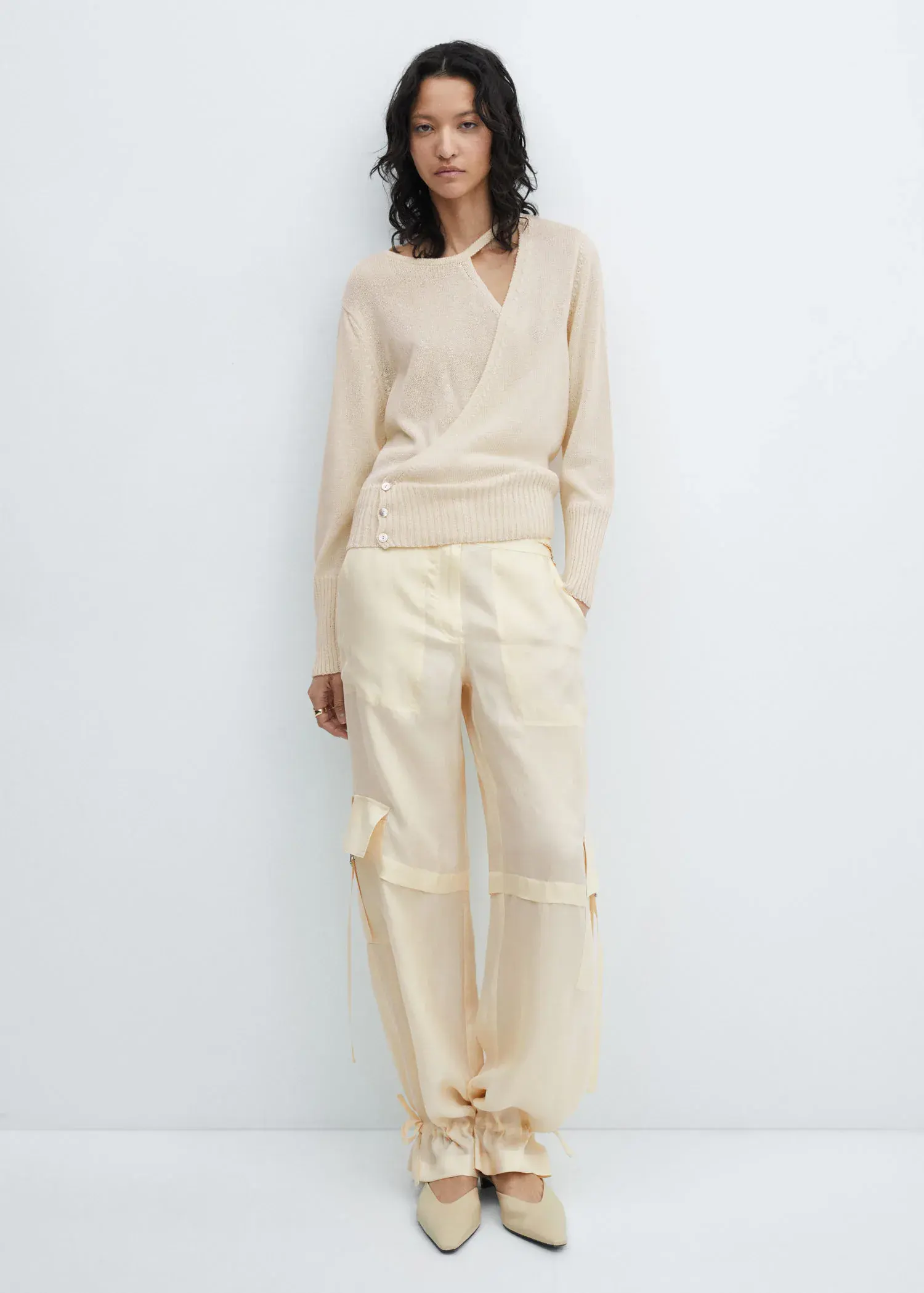 Mango Pullover crossover with slit detail. 1