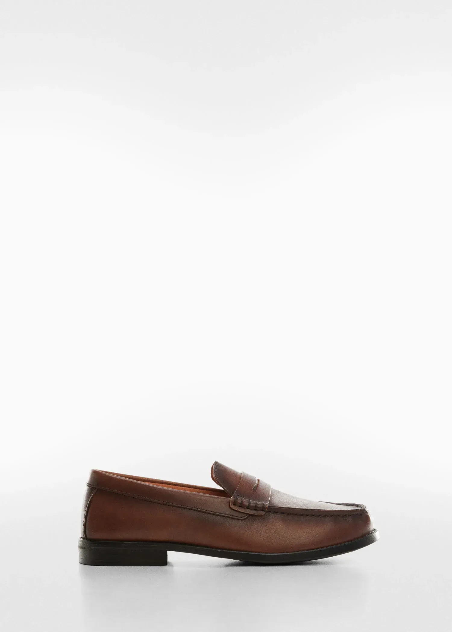 Mango Leather penny loafers. a brown loafer shoe on a white background. 