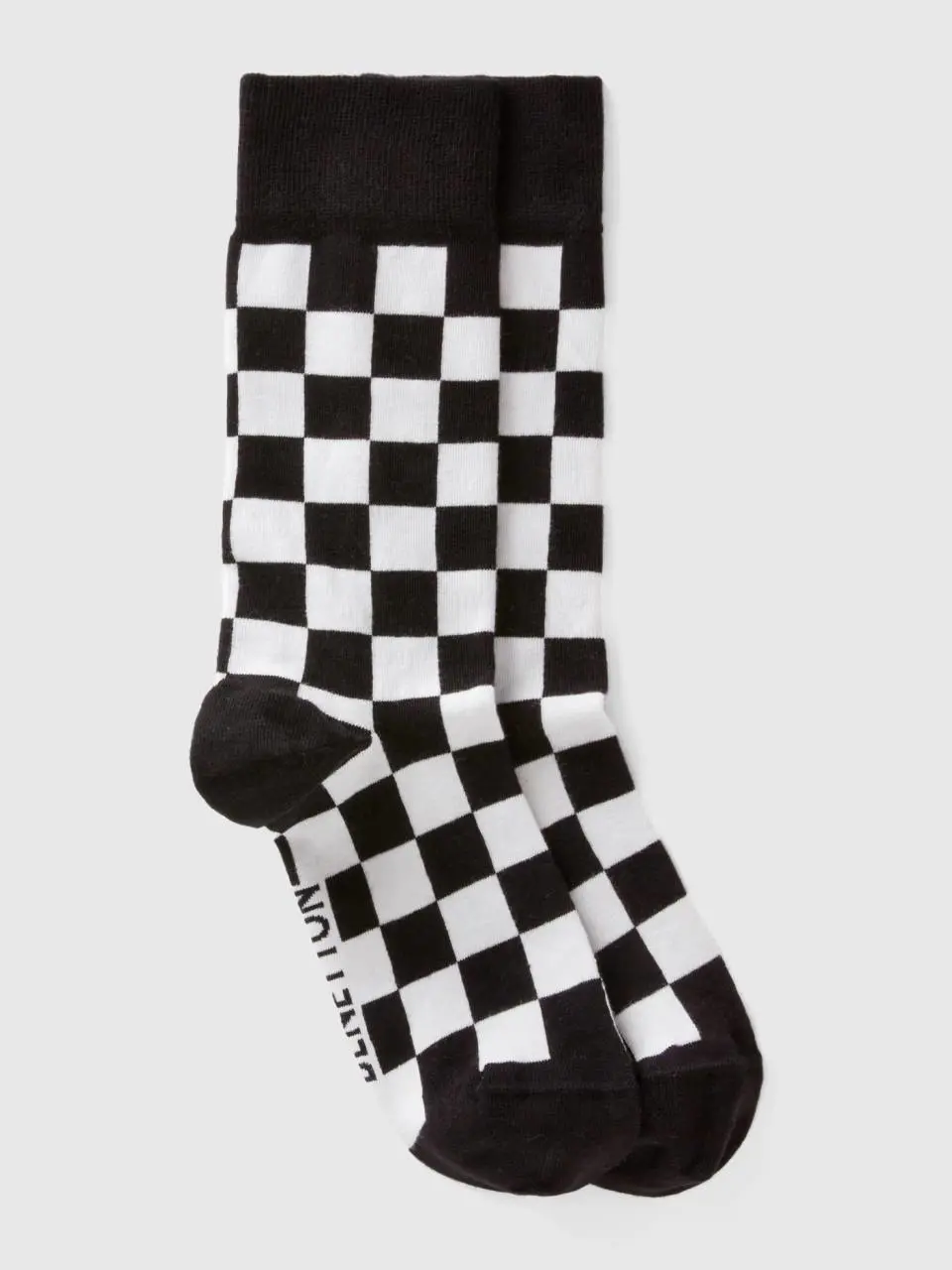 Benetton black and white checkered socks. 1