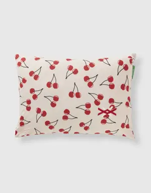 light pink pillow with cherry pattern
