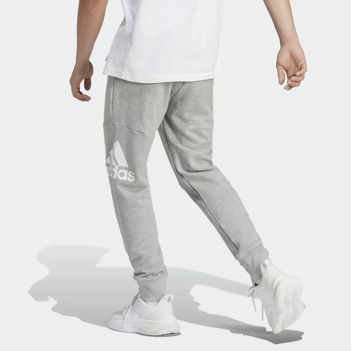 Adidas Essentials French Terry Tapered Cuff Logo Joggers. 2