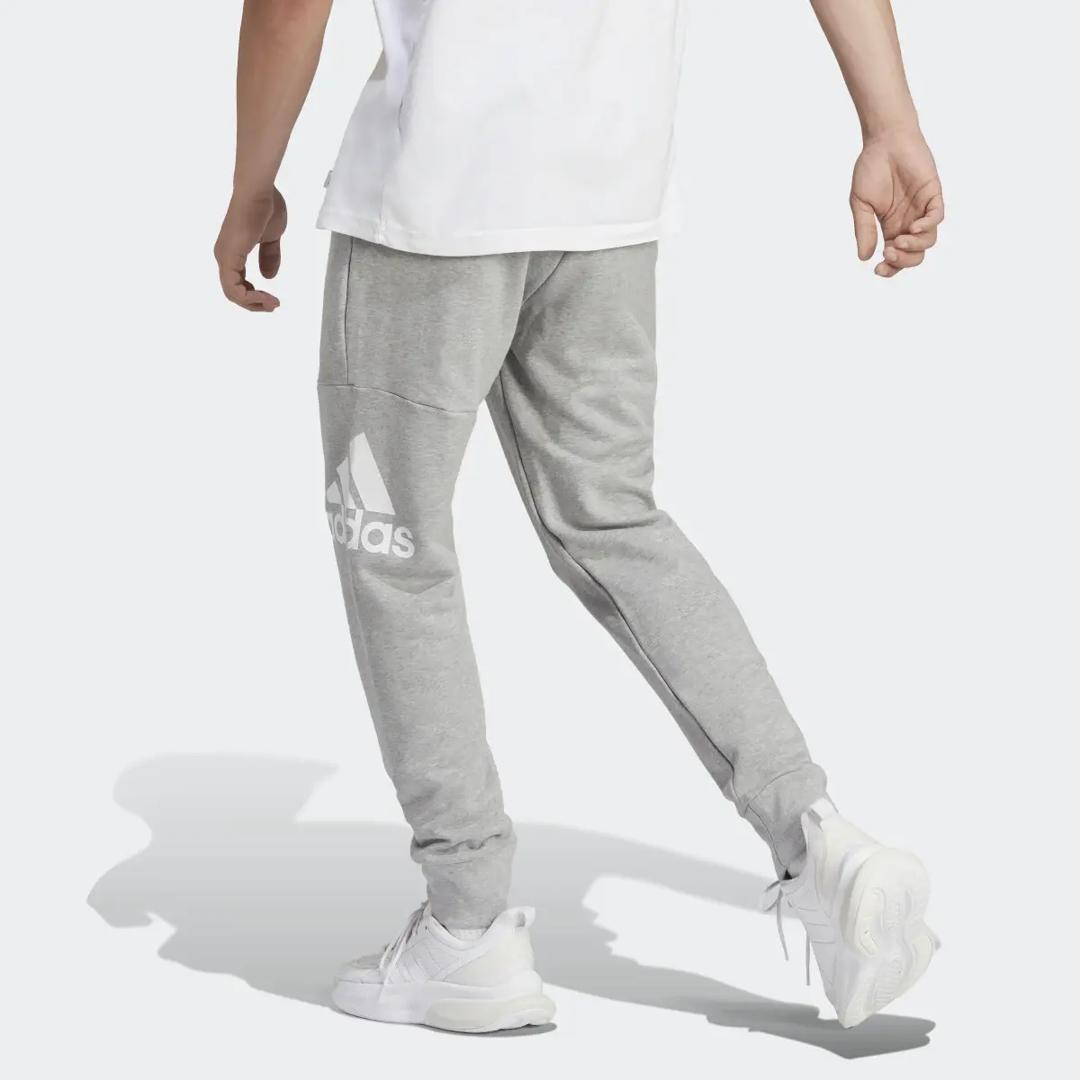 Adidas Essentials French Terry Tapered Cuff Logo Pants. 2