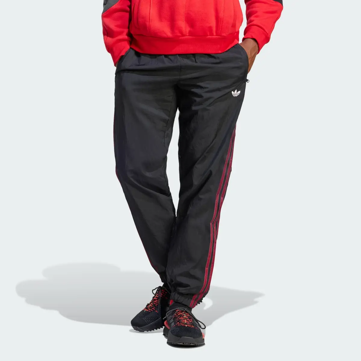 Adidas Rekive Woven Track Pants. 1