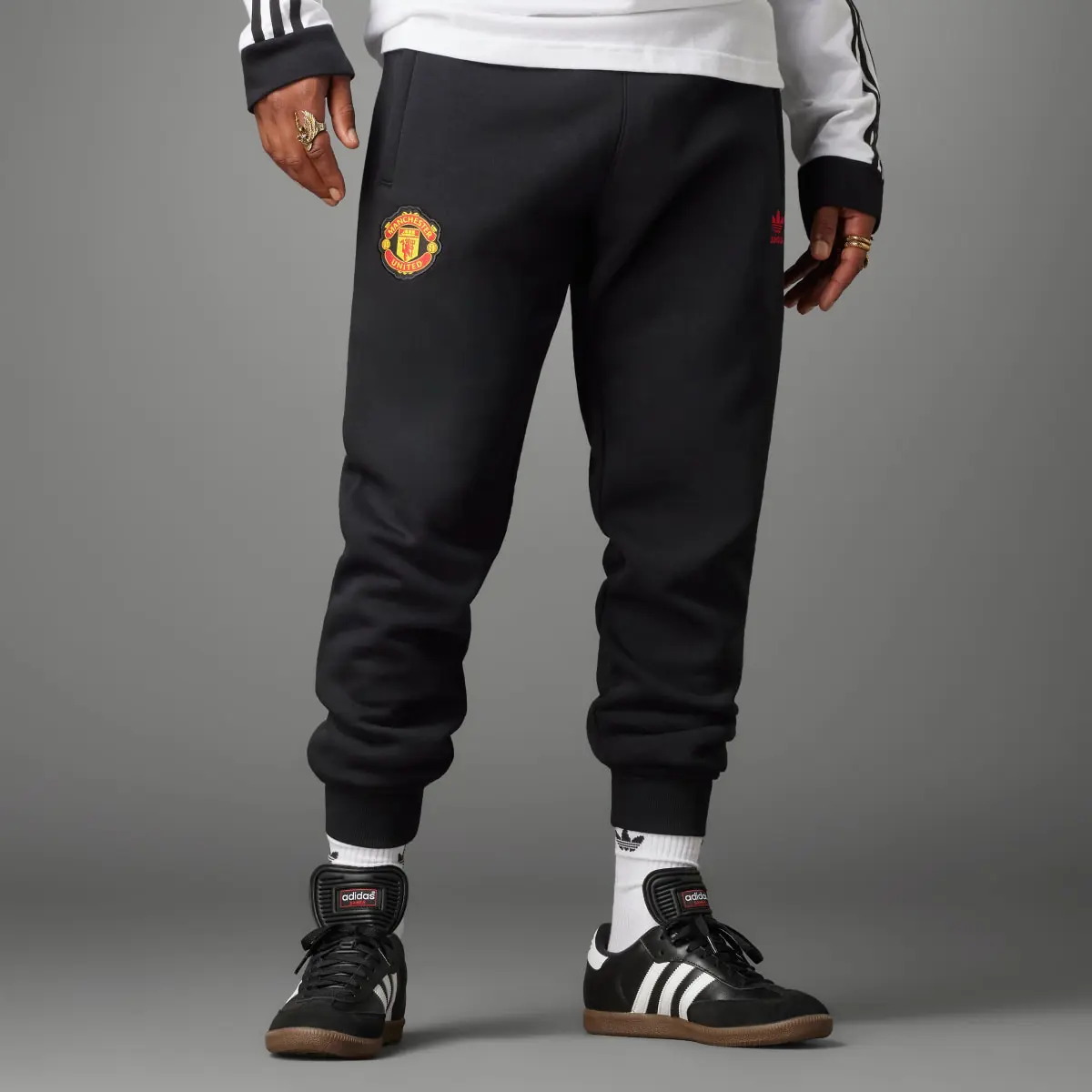 Adidas Calças Trefoil Essentials do Manchester United. 1