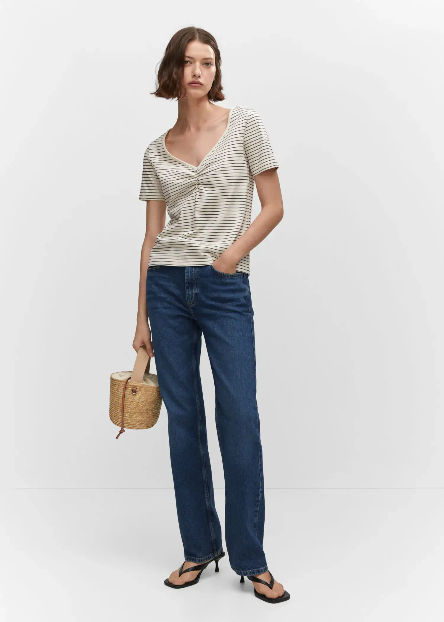 Mango Cotton t-shirt with pucker detail. a woman wearing jeans and a striped shirt. 