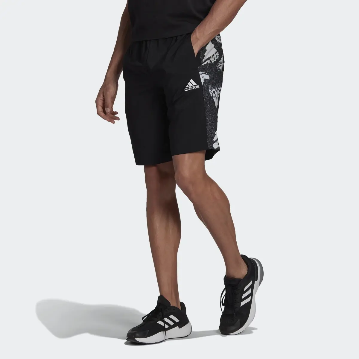 Adidas Essentials BrandLove Woven Shorts. 1