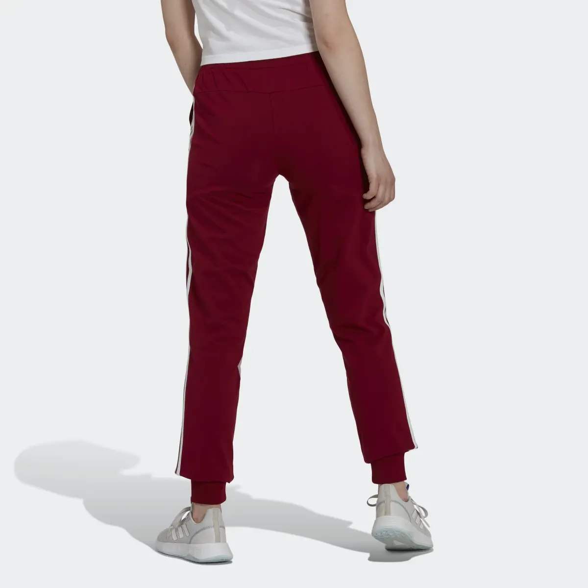 Adidas Pants Essentials 3 Franjas Tejido Jersey. 2
