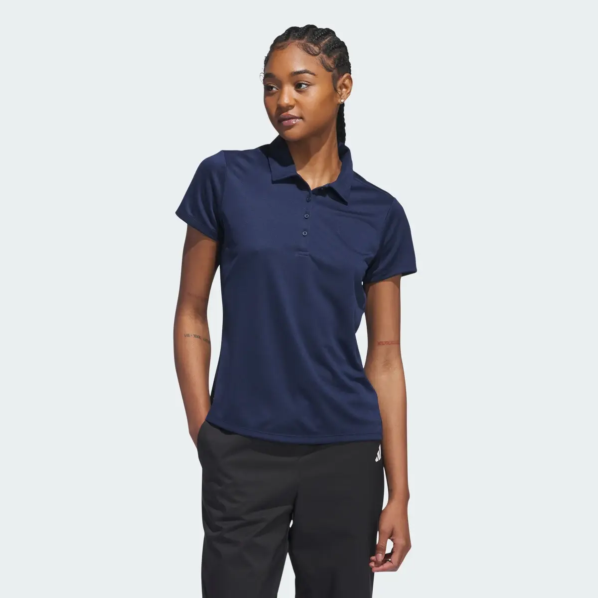 Adidas Women's Solid Performance Short Sleeve Polo Shirt. 2