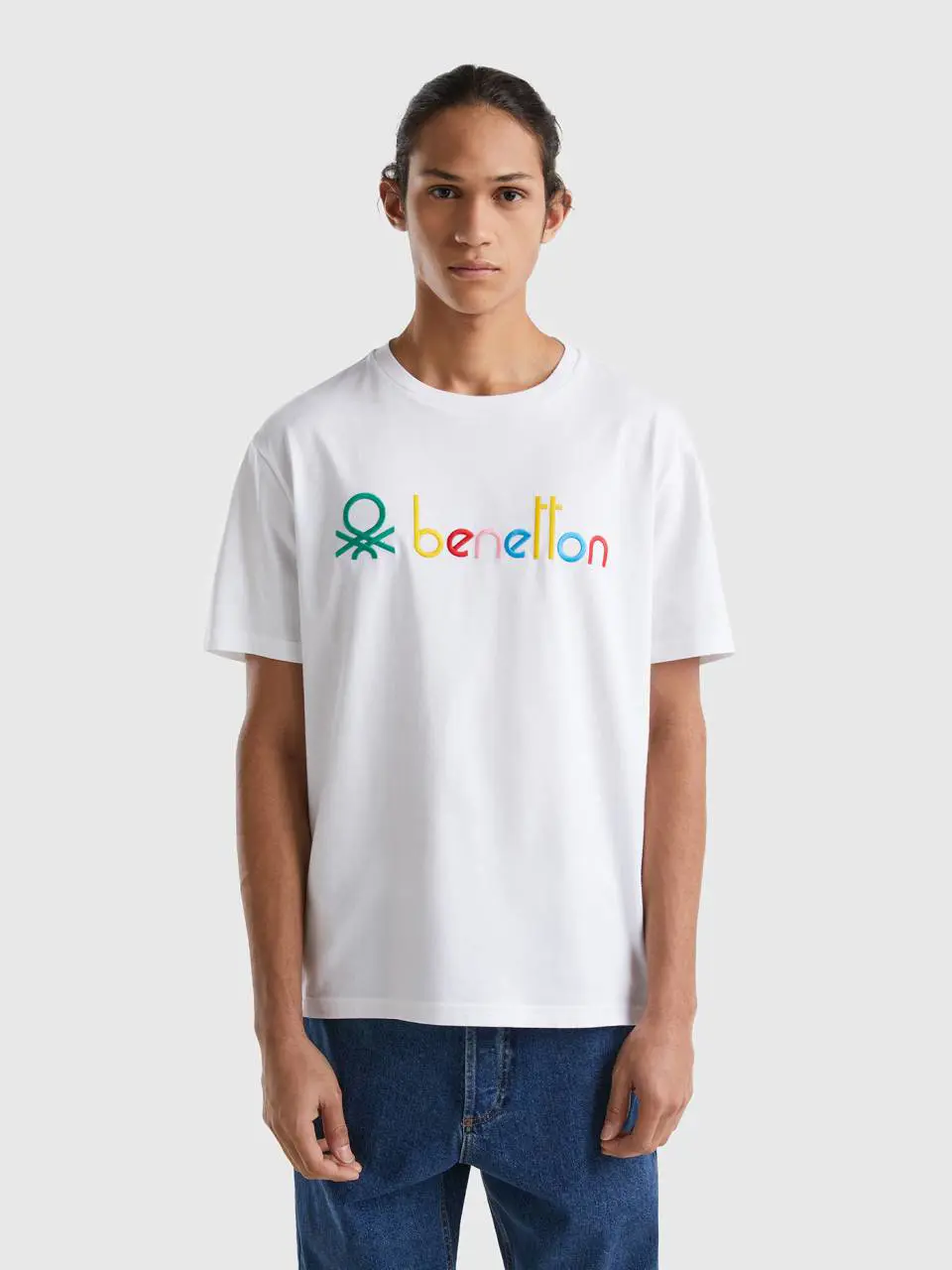 Benetton white t-shirt with multicolored logo. 1