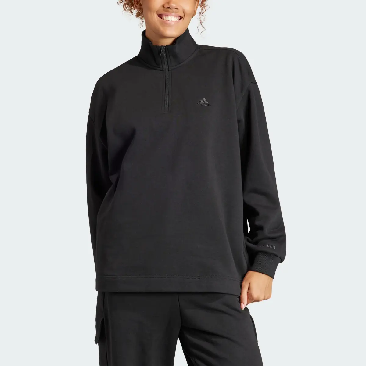 Adidas ALL SZN Fleece Quarter-Zip Sweatshirt. 1