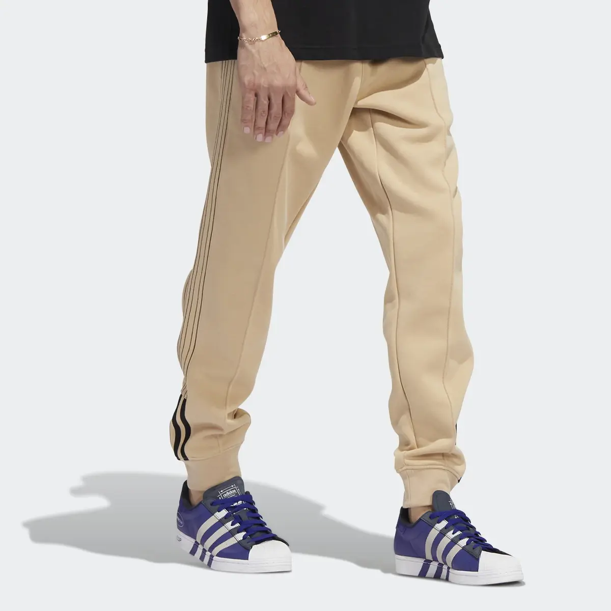 Adidas Fleece SST Track Pants. 3