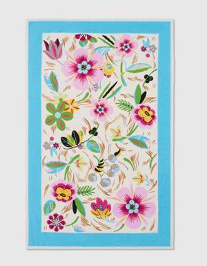 Terrycloth beach blanket with floral print