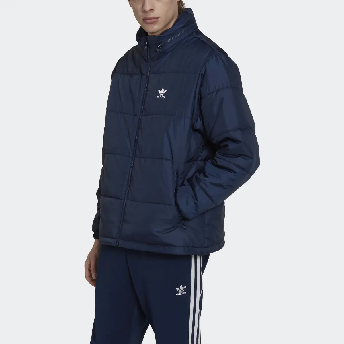 Adidas Giacca Essentials Padded Puffer. 1