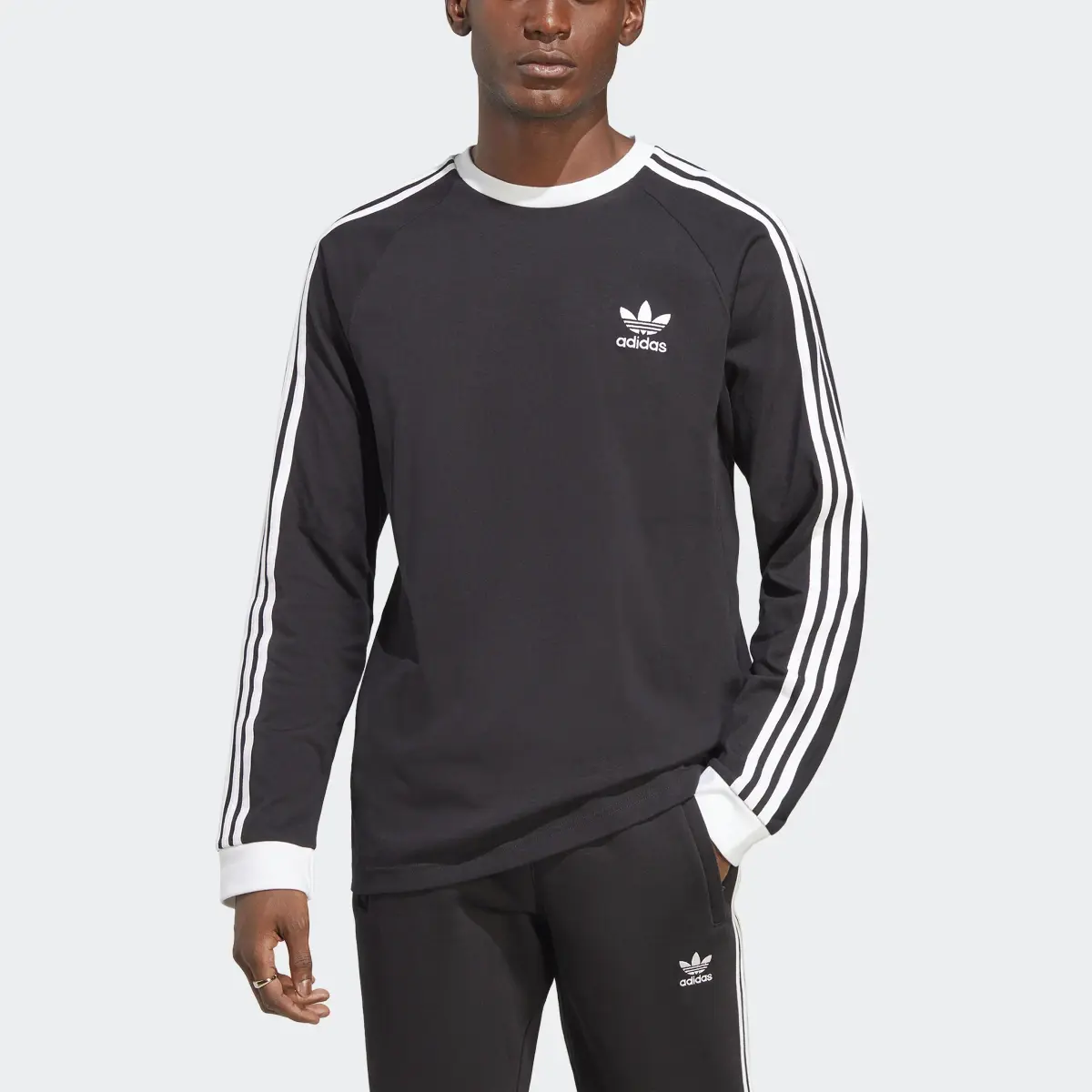 Adidas adicolor Classics 3-Streifen Longsleeve. 1