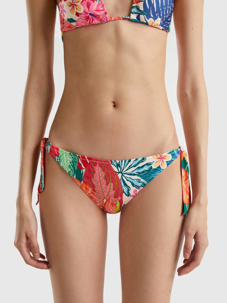 Benetton floral swim bottoms with bows. 1
