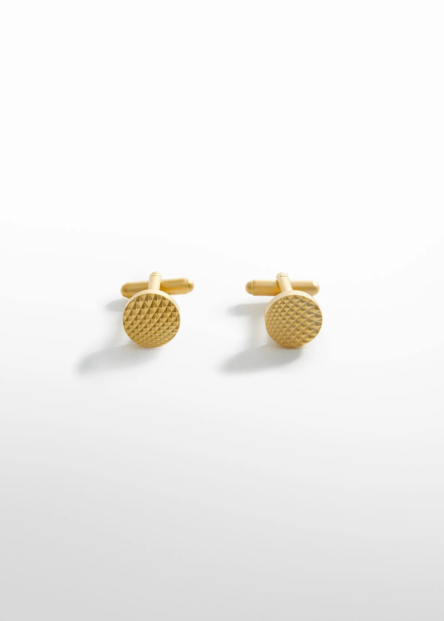 Mango 100% copper geometric cufflinks. a pair of gold cufflinks with a pattern on them. 
