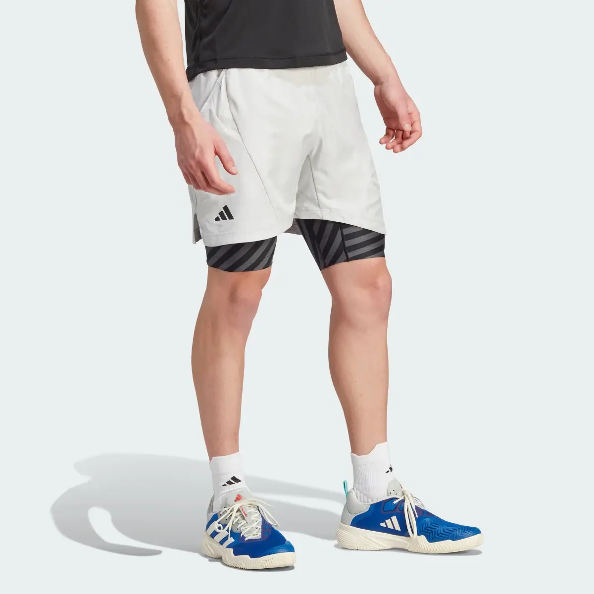 Adidas Tennis AEROREADY Two-in-One Pro Shorts. 1