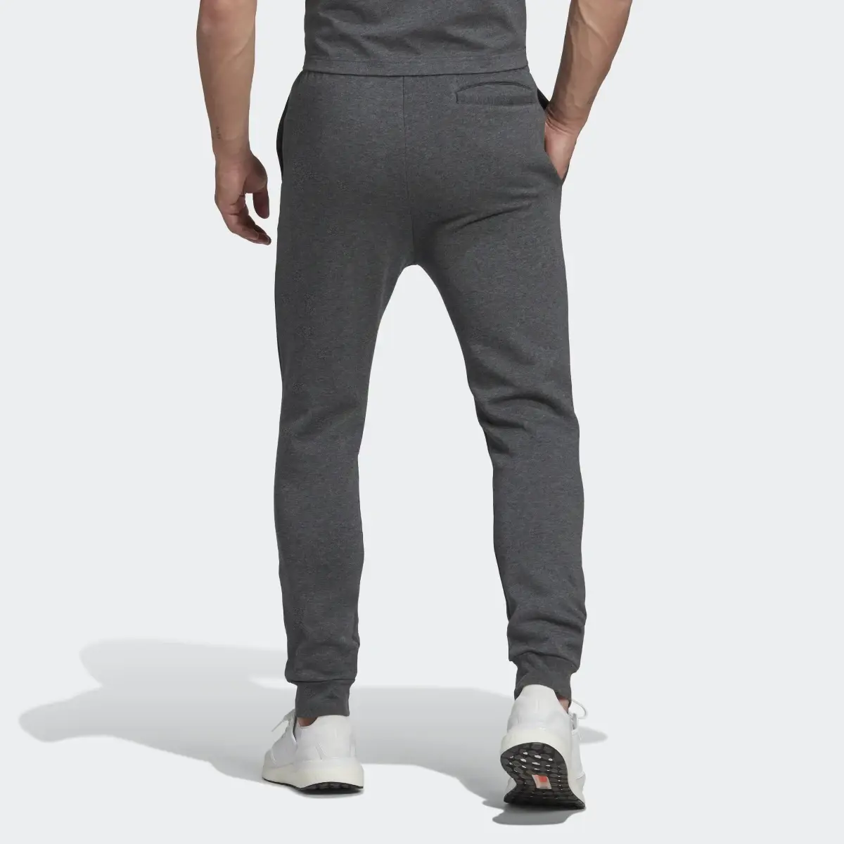 Adidas Essentials Fleece Regular Tapered Pants. 2