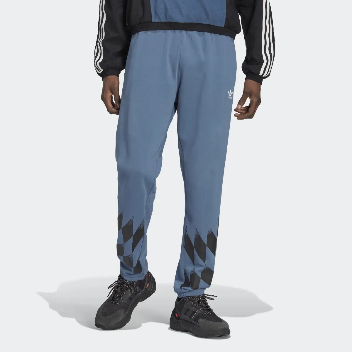 Adidas Rekive Placed Graphic Joggers. 1