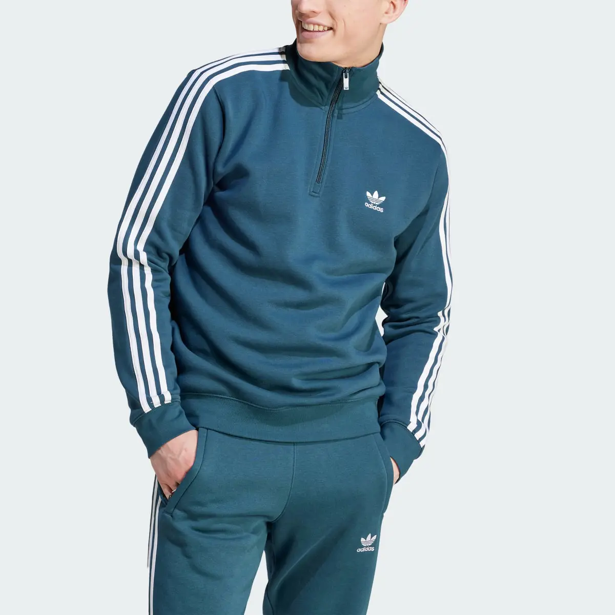 Adidas adicolor Classics 3-Streifen Half-Zip Sweatshirt. 1
