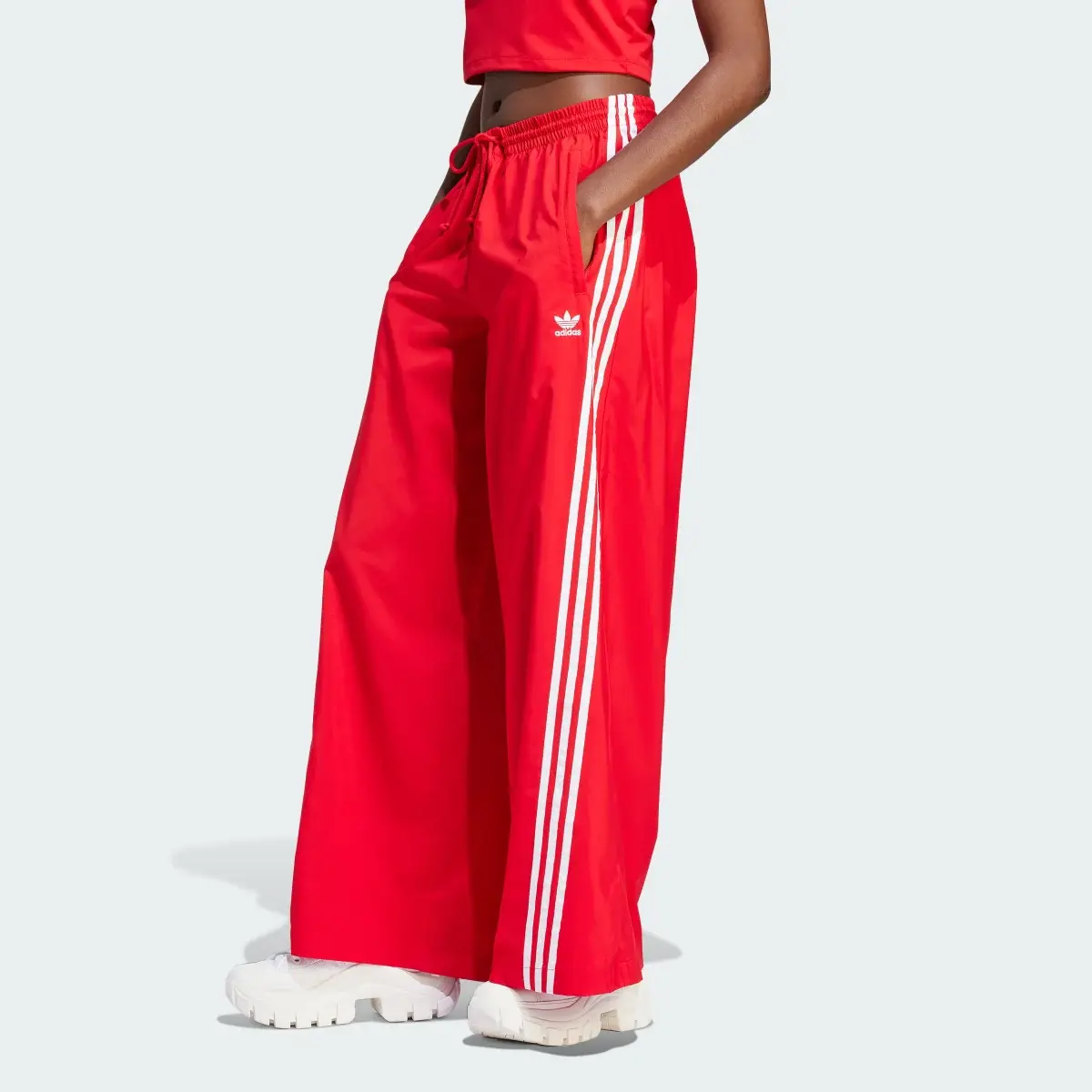 Adidas Adilenium Oversized Tracksuit Bottoms. 1