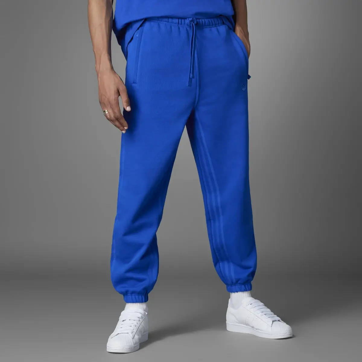 Adidas Blue Version Essentials Joggers. 1