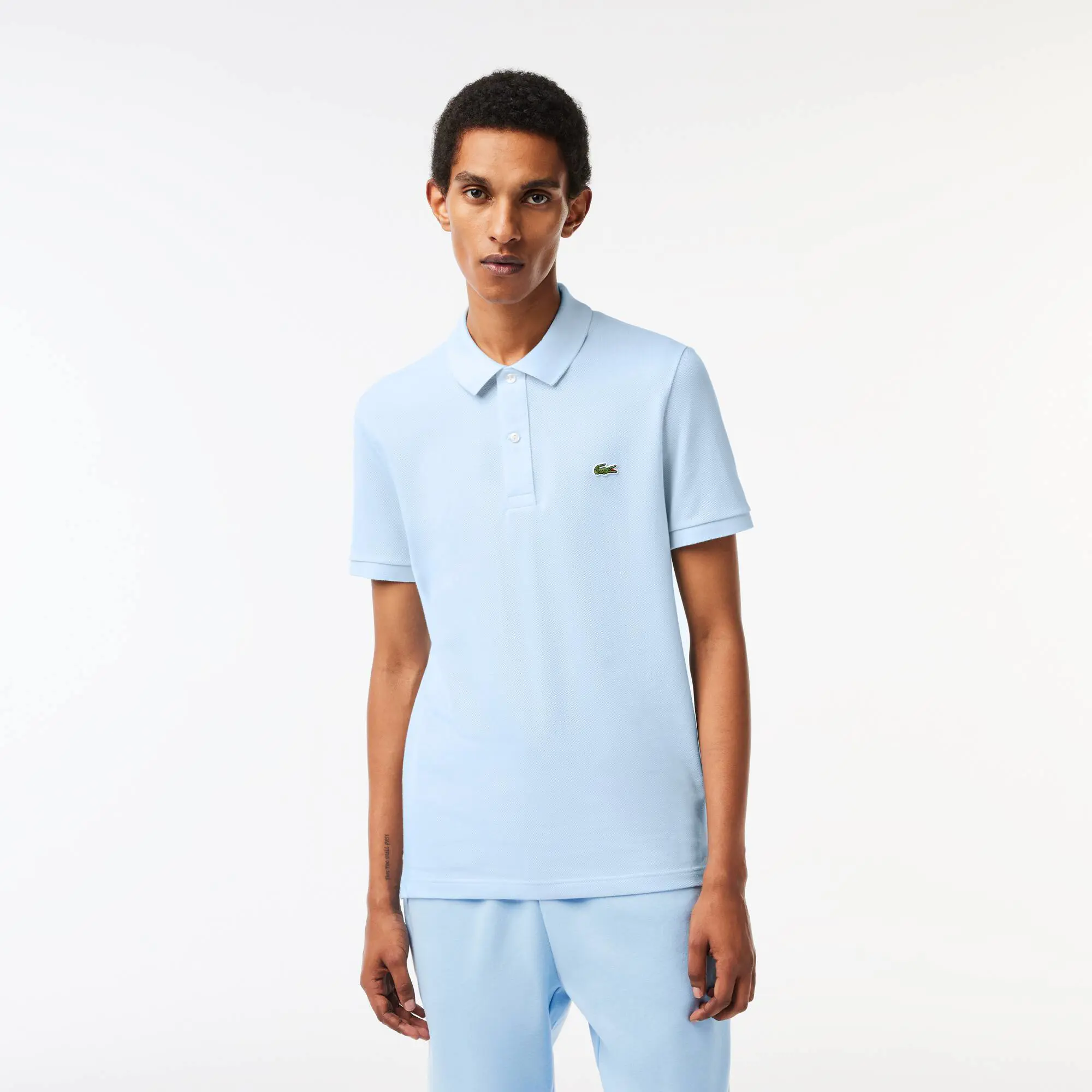 Lacoste Men's Original L.12.12 Slim Fit Petit Piqué Cotton Polo. 1 Lacoste Men's Original L.12.12 Slim Fit Petit Piqué Cotton Polo. 1
