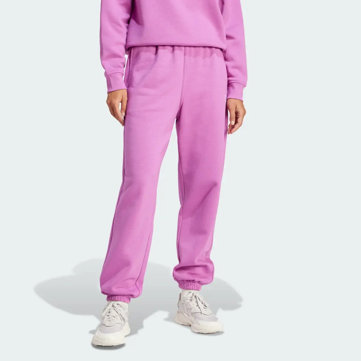 Adidas Pantaloni Essentials Fleece. 1