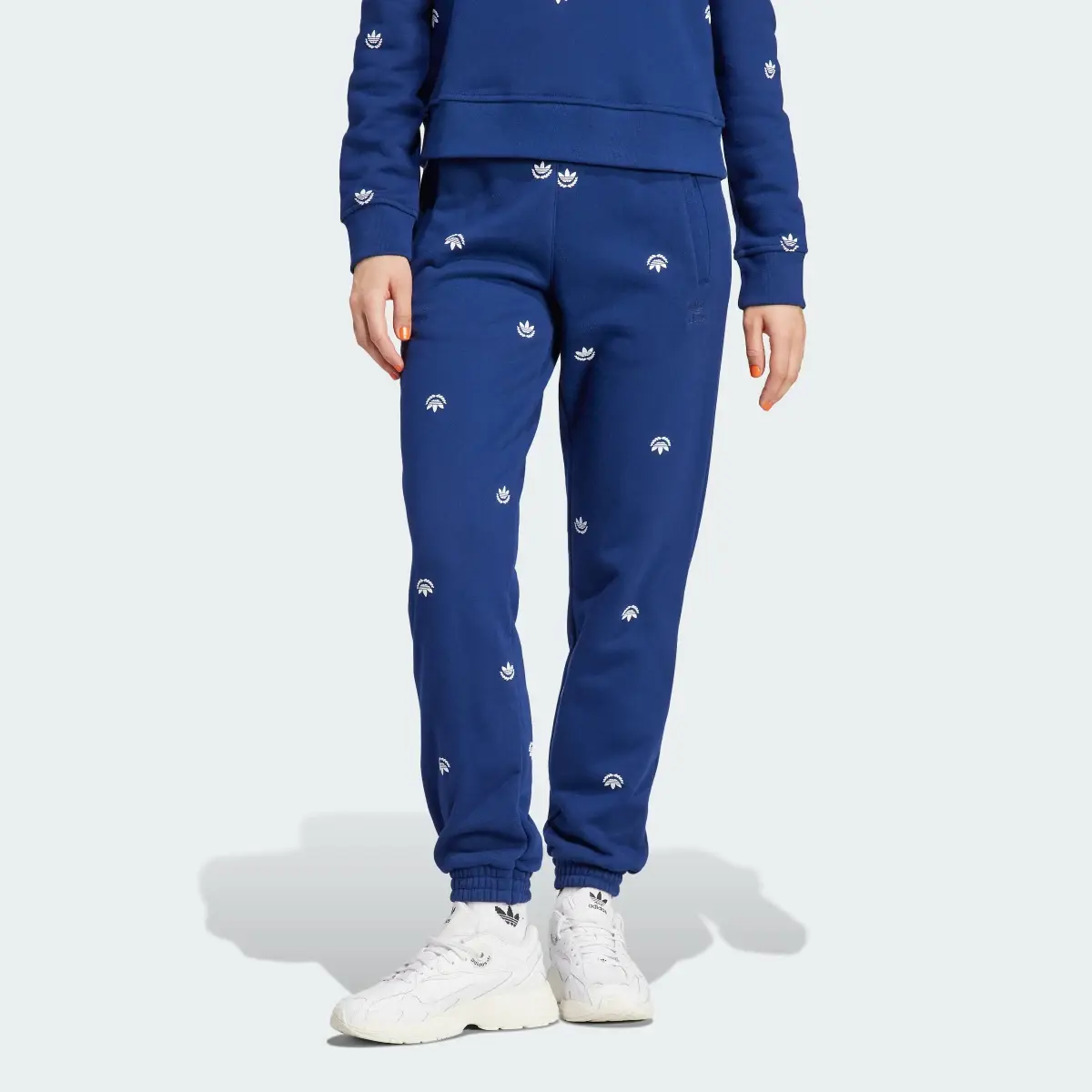 Adidas Allover Mini Crest Logo Sweatpants. 1