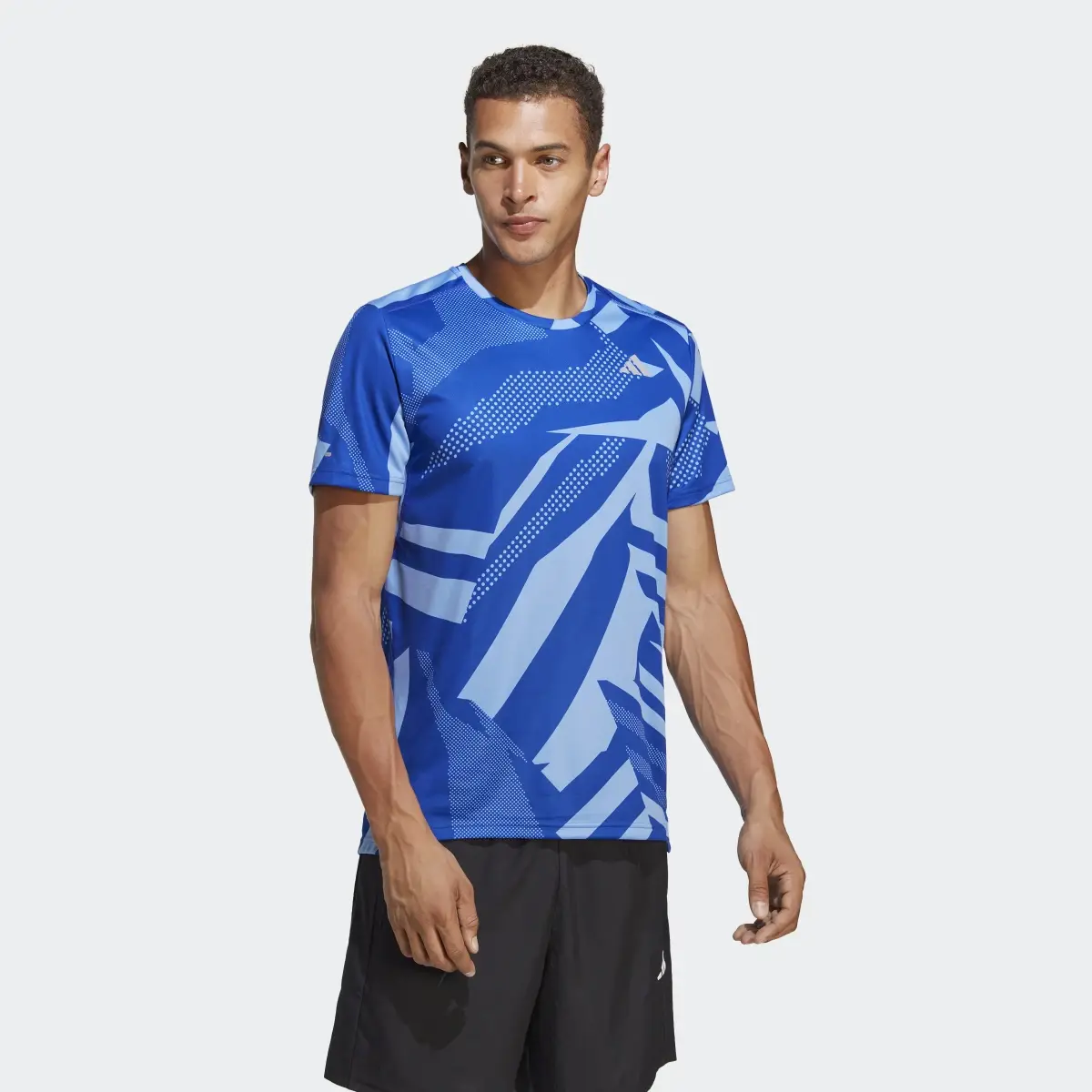 Adidas Playera Own the Run Seasonal. 2