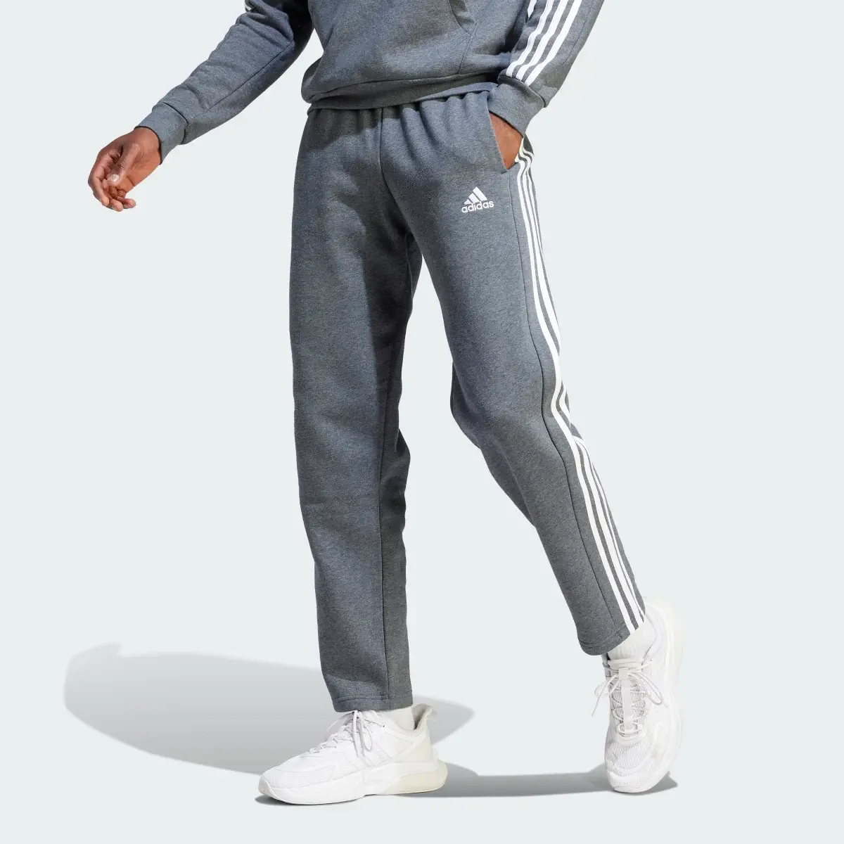 Adidas Essentials 3-Stripes Open Hem Fleece Pants. 1