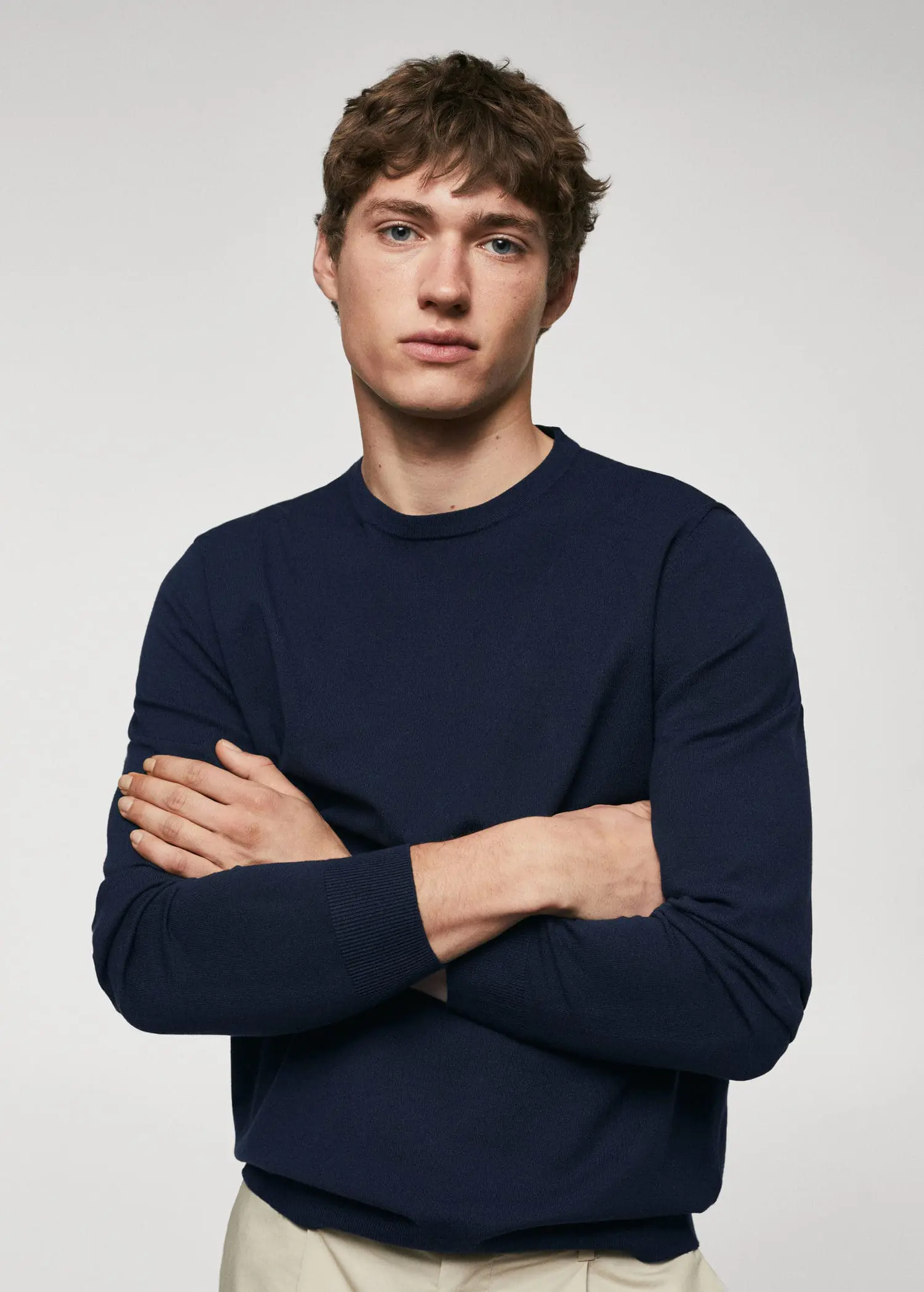 Mango Fine-knit sweater. a man with his arms crossed wearing a sweater. 