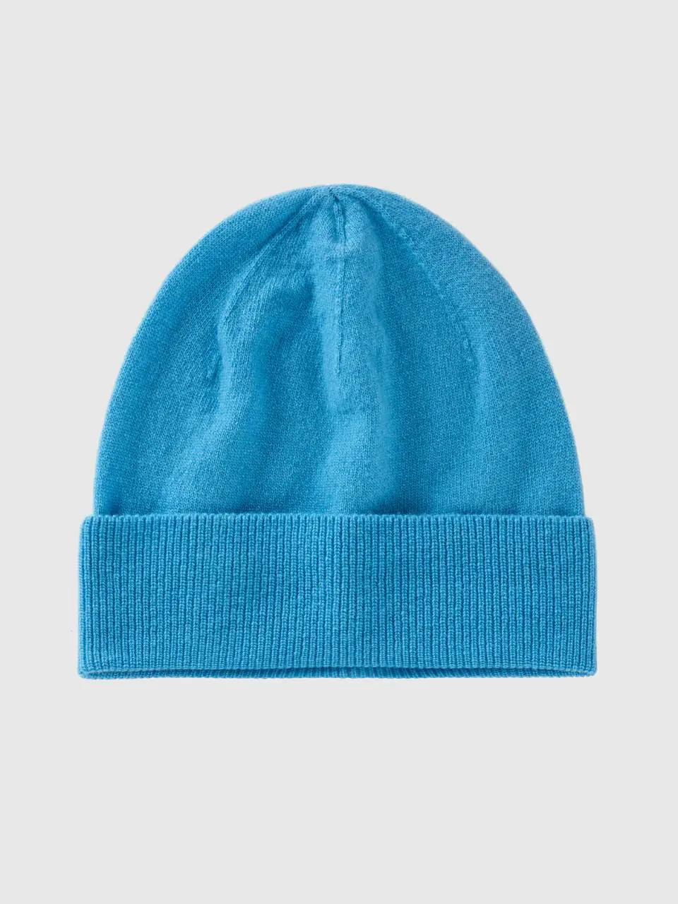Benetton light blue hat in pure merino wool. 1