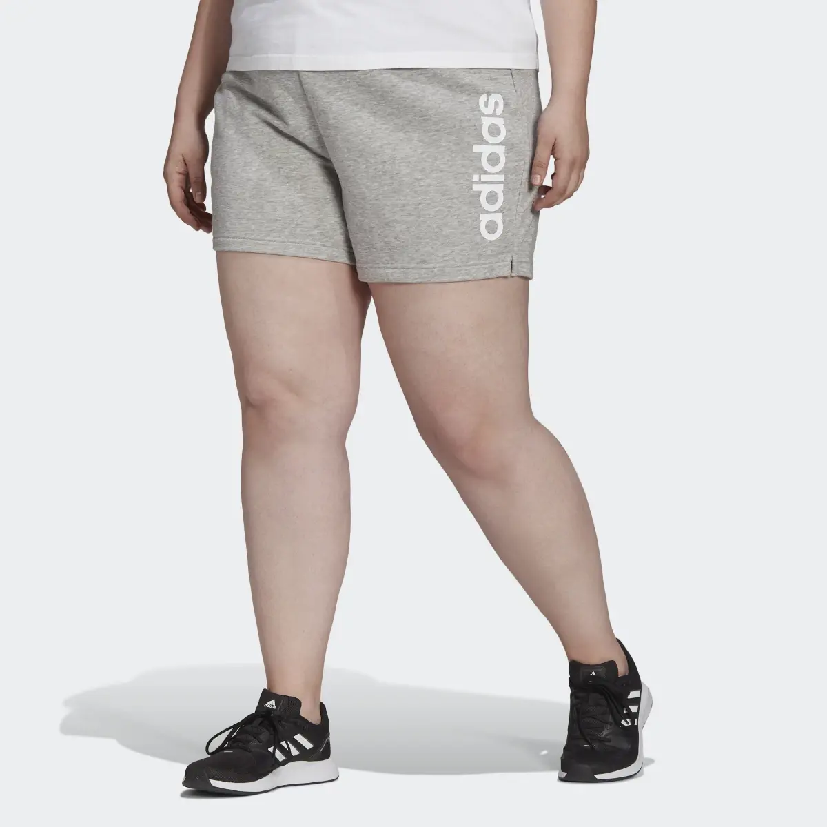 Adidas Essentials Slim Logo Shorts (Plus Size). 1