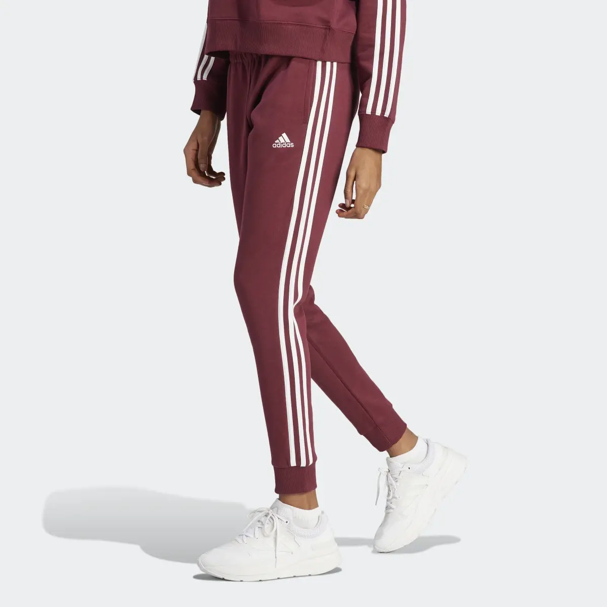 Adidas Essentials 3-Stripes French Terry Cuffed Joggers. 1