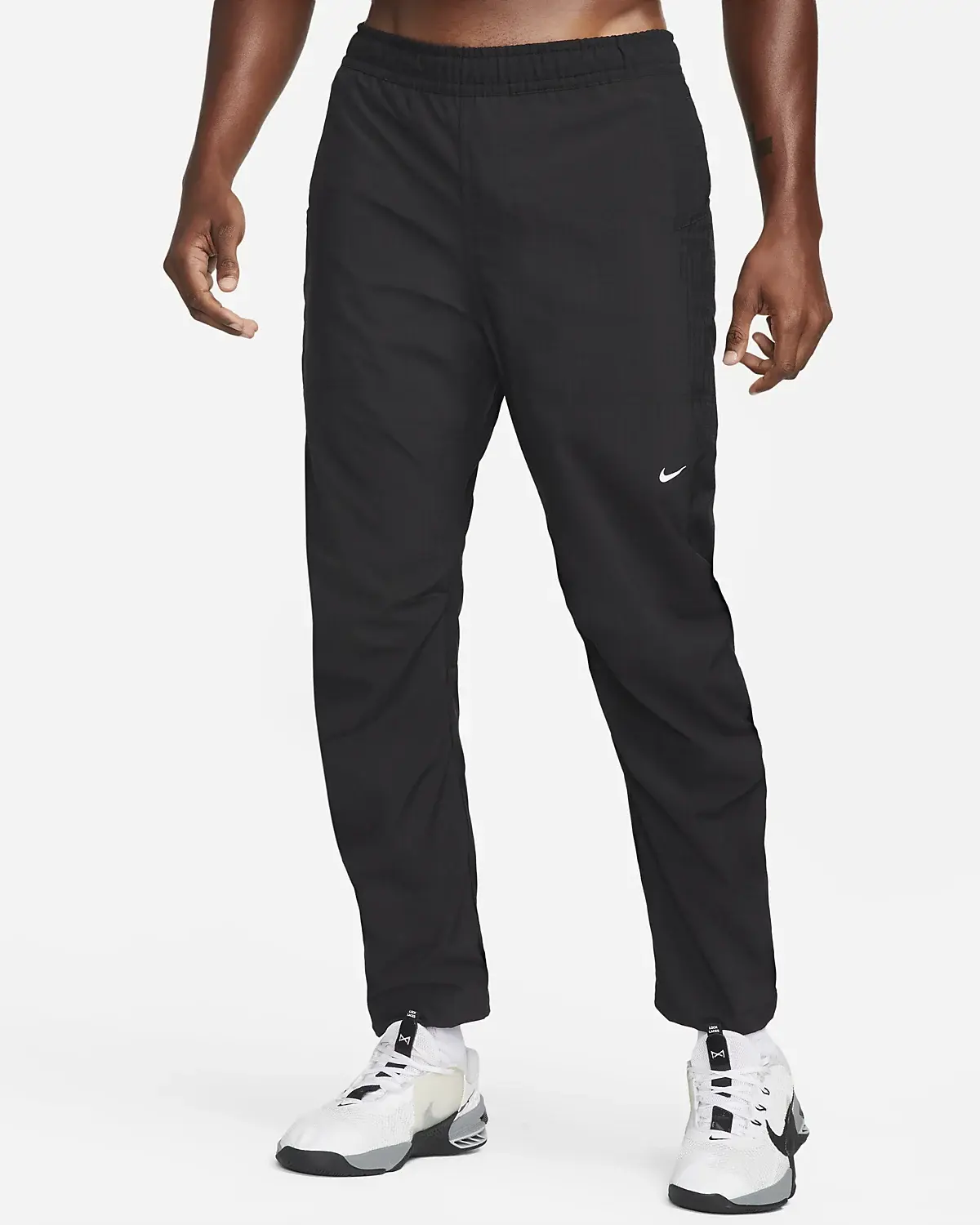 Nike Męskie spodnie z tkaniny do fitnessu. 1