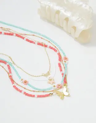 American Eagle O Coral Daisy Butterfly Necklace 3-Pack. 2