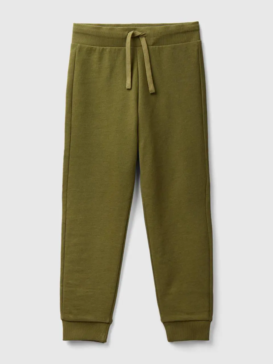 Benetton sporty trousers with drawstring. 1