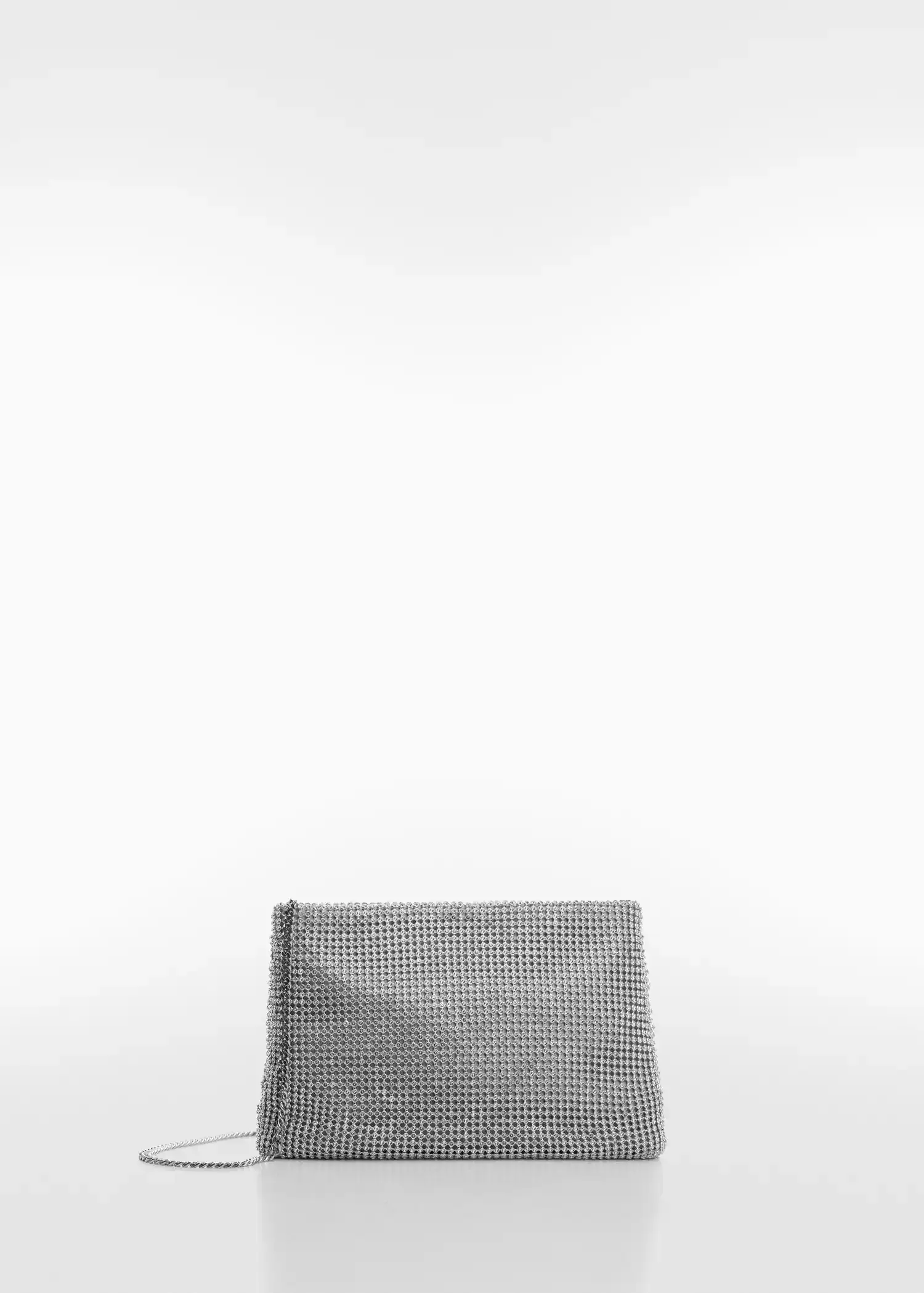 Mango Rhinestone chain bag. a silver purse sitting on top of a white table. 